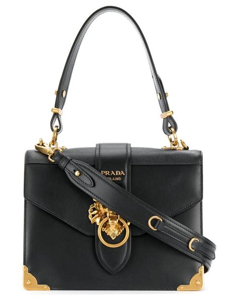 lion embellished shoulder bag